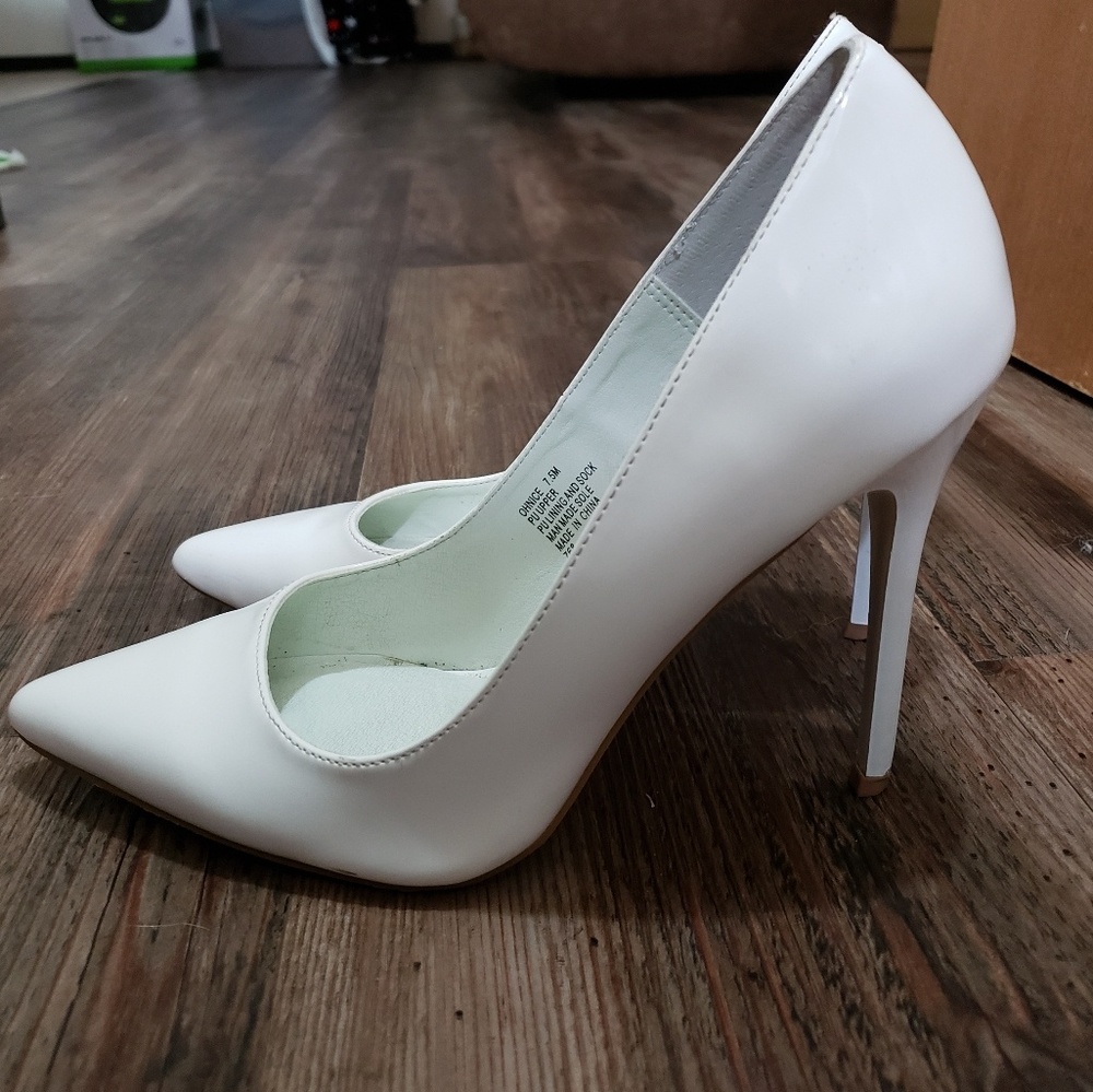 White pointed heels